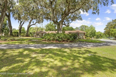 Located in the highly desirable Dogwood Estates golf course on Brooksville Country Club At Majestic Oaks in Florida - for sale on GolfHomes.com, golf home, golf lot