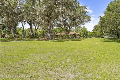 Located in the highly desirable Dogwood Estates golf course on Brooksville Country Club At Majestic Oaks in Florida - for sale on GolfHomes.com, golf home, golf lot