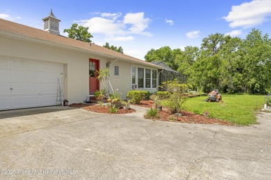 Located in the highly desirable Dogwood Estates golf course on Brooksville Country Club At Majestic Oaks in Florida - for sale on GolfHomes.com, golf home, golf lot