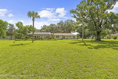 Located in the highly desirable Dogwood Estates golf course on Brooksville Country Club At Majestic Oaks in Florida - for sale on GolfHomes.com, golf home, golf lot