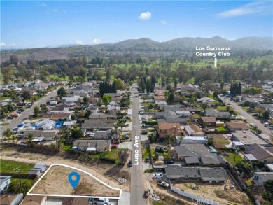 Rare opportunity to own a beautiful lot in a serene neighborhood on Los Serranos Country Club in California - for sale on GolfHomes.com, golf home, golf lot