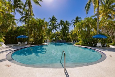 Located in the coveted Sanctuary enclave of the Key West Golf on Key West Golf Club in Florida - for sale on GolfHomes.com, golf home, golf lot