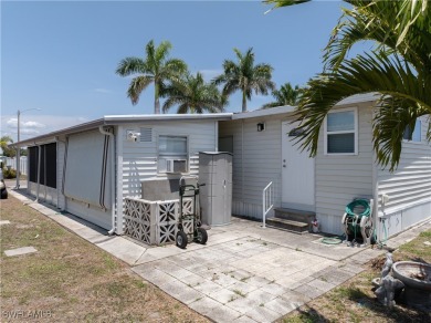 Charming and Unique Home in Highly Sought-After Tamiami Village on Six Lakes Country Club in Florida - for sale on GolfHomes.com, golf home, golf lot