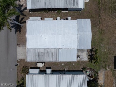 Charming and Unique Home in Highly Sought-After Tamiami Village on Six Lakes Country Club in Florida - for sale on GolfHomes.com, golf home, golf lot