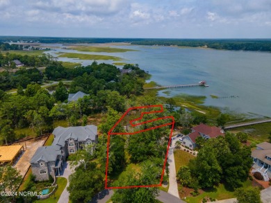 Excellent Opportunity To Seize A Waterfront Building & Dock Lot on Lockwood Folly Country Club in North Carolina - for sale on GolfHomes.com, golf home, golf lot