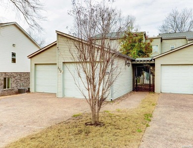 Discover comfort, convenience, and community in this 3-bedroom on Diamondhead Golf and Country Club in Arkansas - for sale on GolfHomes.com, golf home, golf lot
