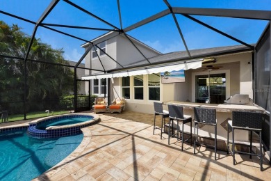 Welcome to one of the most desirable homes in Harmony Reserve, a on Esplanade Golf and Country at Lakewood Ranch in Florida - for sale on GolfHomes.com, golf home, golf lot