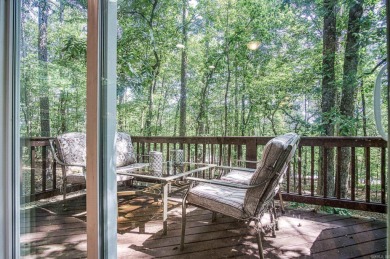 Enjoy the serenity and beauty of the forest from the deck of on Cortez Golf Course in Arkansas - for sale on GolfHomes.com, golf home, golf lot
