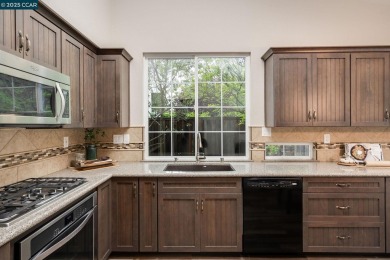 Located in the desirable Oak Hollow subdivision, this updated on Oakhurst Country Club in California - for sale on GolfHomes.com, golf home, golf lot