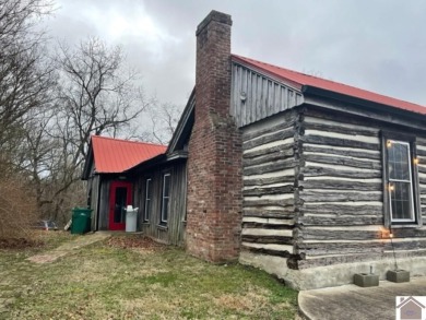 Located on Main Street in downtown Cadiz, KY, this quaint cabin on Arrowhead Golf Club in Kentucky - for sale on GolfHomes.com, golf home, golf lot