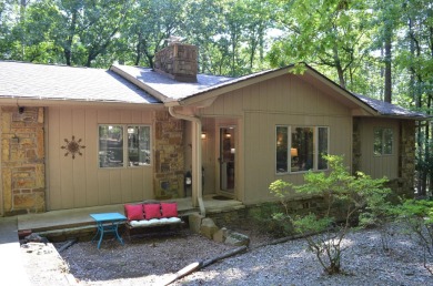 Enjoy the serenity and beauty of the forest from the deck of on Cortez Golf Course in Arkansas - for sale on GolfHomes.com, golf home, golf lot
