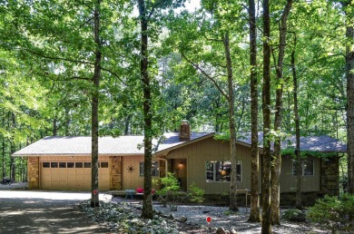Enjoy the serenity and beauty of the forest from the deck of on Cortez Golf Course in Arkansas - for sale on GolfHomes.com, golf home, golf lot