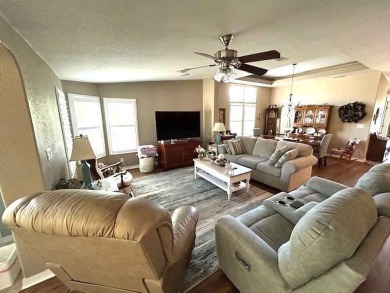 Step into this immaculately maintained 2-bedroom, 2-bathroom on Sun n Lake Golf and Country Club in Florida - for sale on GolfHomes.com, golf home, golf lot