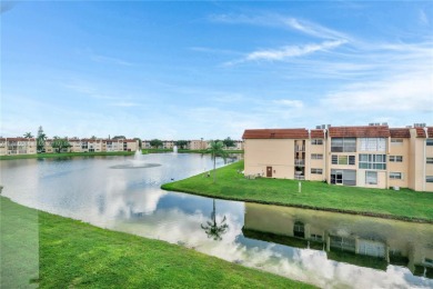 55+ Updated 2-bed/2-bath Condo W/ Full Impact Windows Front And on Sunrise Lakes Phase III in Florida - for sale on GolfHomes.com, golf home, golf lot