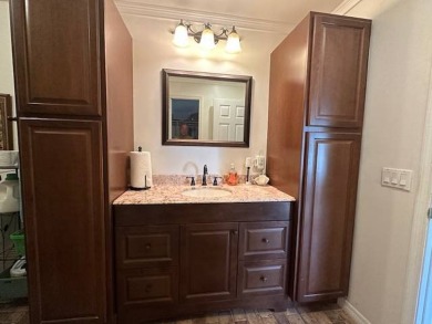 Turnkey 2-Bedroom, 2-Bath Home with Breathtaking Lake Views in on Vista Plantation Golf Club in Florida - for sale on GolfHomes.com, golf home, golf lot