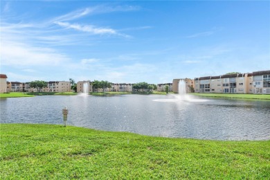 55+ Updated 2-bed/2-bath Condo W/ Full Impact Windows Front And on Sunrise Lakes Phase III in Florida - for sale on GolfHomes.com, golf home, golf lot