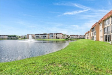 55+ Updated 2-bed/2-bath Condo W/ Full Impact Windows Front And on Sunrise Lakes Phase III in Florida - for sale on GolfHomes.com, golf home, golf lot