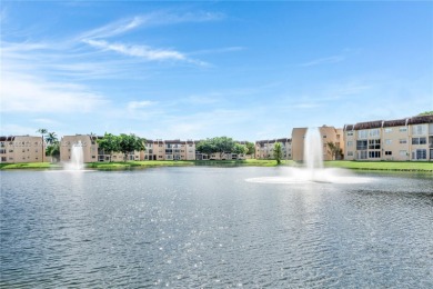 55+ Updated 2-bed/2-bath Condo W/ Full Impact Windows Front And on Sunrise Lakes Phase III in Florida - for sale on GolfHomes.com, golf home, golf lot