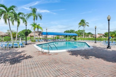 55+ Updated 2-bed/2-bath Condo W/ Full Impact Windows Front And on Sunrise Lakes Phase III in Florida - for sale on GolfHomes.com, golf home, golf lot