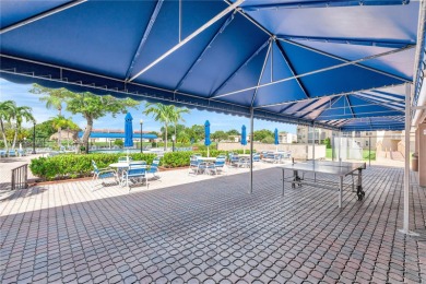 55+ Updated 2-bed/2-bath Condo W/ Full Impact Windows Front And on Sunrise Lakes Phase III in Florida - for sale on GolfHomes.com, golf home, golf lot