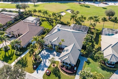 This stunning home, complete with impact windows and door and on Hobe Sound Golf Club in Florida - for sale on GolfHomes.com, golf home, golf lot