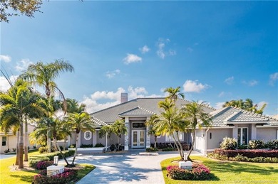 This stunning home, complete with impact windows and door and on Hobe Sound Golf Club in Florida - for sale on GolfHomes.com, golf home, golf lot