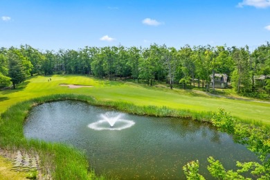 Nestled beside Hole 10 of Garland's scenic Fountains Course, 824 on Garland Resort and Golf Club  in Michigan - for sale on GolfHomes.com, golf home, golf lot