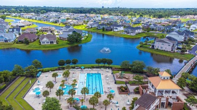 Welcome to 966 Crystal Water Way, a stunning custom-built home on Myrtlewood Golf Course and Club  in South Carolina - for sale on GolfHomes.com, golf home, golf lot