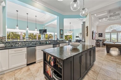 This stunning home, complete with impact windows and door and on Hobe Sound Golf Club in Florida - for sale on GolfHomes.com, golf home, golf lot