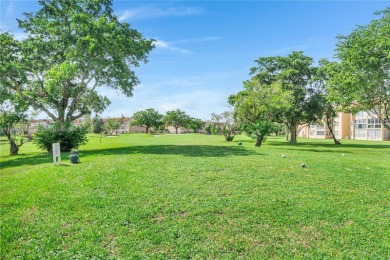 55+ Updated 2-bed/2-bath Condo W/ Full Impact Windows Front And on Sunrise Lakes Phase III in Florida - for sale on GolfHomes.com, golf home, golf lot