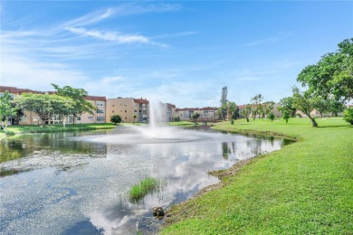 55+ Updated 2-bed/2-bath Condo W/ Full Impact Windows Front And on Sunrise Lakes Phase III in Florida - for sale on GolfHomes.com, golf home, golf lot
