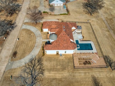 This breathtaking 4-bedroom, 3.5-bathroom, 3,953 sq. ft. home in on Shawnee Country Club in Oklahoma - for sale on GolfHomes.com, golf home, golf lot