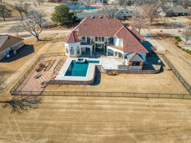 This breathtaking 4-bedroom, 3.5-bathroom, 3,953 sq. ft. home in on Shawnee Country Club in Oklahoma - for sale on GolfHomes.com, golf home, golf lot