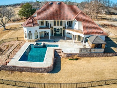 This breathtaking 4-bedroom, 3.5-bathroom, 3,953 sq. ft. home in on Shawnee Country Club in Oklahoma - for sale on GolfHomes.com, golf home, golf lot