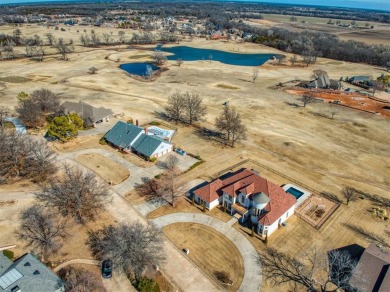 This breathtaking 4-bedroom, 3.5-bathroom, 3,953 sq. ft. home in on Shawnee Country Club in Oklahoma - for sale on GolfHomes.com, golf home, golf lot