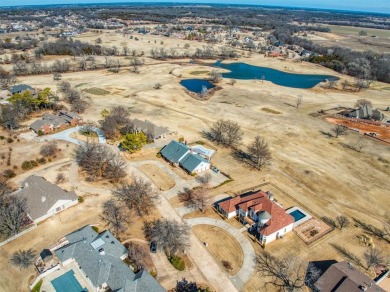 This breathtaking 4-bedroom, 3.5-bathroom, 3,953 sq. ft. home in on Shawnee Country Club in Oklahoma - for sale on GolfHomes.com, golf home, golf lot