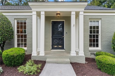Nestled on a quiet street in sought-after Collier Hills, this on Bobby Jones Golf Club in Georgia - for sale on GolfHomes.com, golf home, golf lot