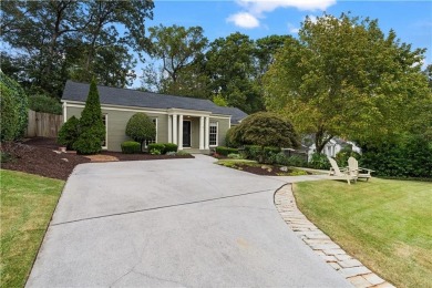 Nestled on a quiet street in sought-after Collier Hills, this on Bobby Jones Golf Club in Georgia - for sale on GolfHomes.com, golf home, golf lot