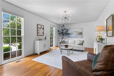 Nestled on a quiet street in sought-after Collier Hills, this on Bobby Jones Golf Club in Georgia - for sale on GolfHomes.com, golf home, golf lot