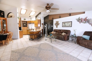Welcome to this charming and move-in-ready 3-bedroom, 2-bathroom on Las Barrancas Golf Course in Arizona - for sale on GolfHomes.com, golf home, golf lot
