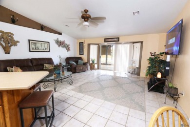 Welcome to this charming and move-in-ready 3-bedroom, 2-bathroom on Las Barrancas Golf Course in Arizona - for sale on GolfHomes.com, golf home, golf lot