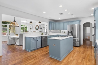 Nestled on a quiet street in sought-after Collier Hills, this on Bobby Jones Golf Club in Georgia - for sale on GolfHomes.com, golf home, golf lot