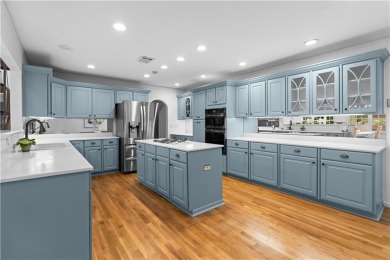 Nestled on a quiet street in sought-after Collier Hills, this on Bobby Jones Golf Club in Georgia - for sale on GolfHomes.com, golf home, golf lot
