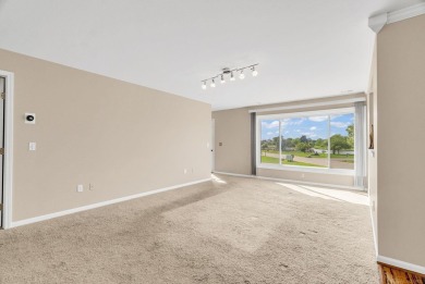 Beautiful second floor condo with amazing views of the sprawling on St. Clair Shores Country Club in Michigan - for sale on GolfHomes.com, golf home, golf lot