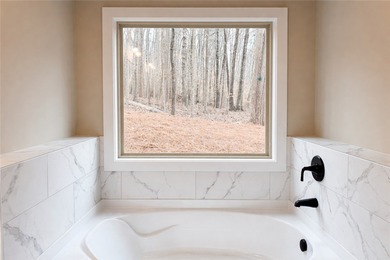 New construction located in Chickasaw Point, a gated community on The Trail At Chickasaw Pointe in South Carolina - for sale on GolfHomes.com, golf home, golf lot