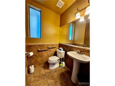 This spacious 2-story custom pool home in the gated Los Lagos on Los Lagos Golf Club in Arizona - for sale on GolfHomes.com, golf home, golf lot