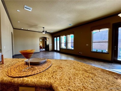 This spacious 2-story custom pool home in the gated Los Lagos on Los Lagos Golf Club in Arizona - for sale on GolfHomes.com, golf home, golf lot
