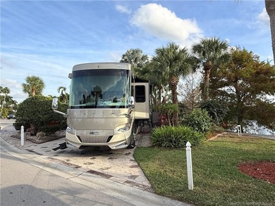 Discover a true g?m th?t r?define? luxur? and outdoor living! on St. Lucie Trail Golf Club in Florida - for sale on GolfHomes.com, golf home, golf lot