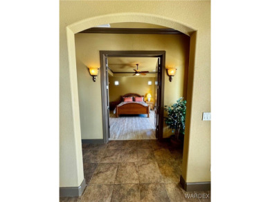 This spacious 2-story custom pool home in the gated Los Lagos on Los Lagos Golf Club in Arizona - for sale on GolfHomes.com, golf home, golf lot