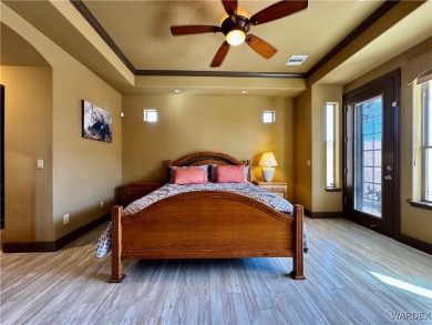 This spacious 2-story custom pool home in the gated Los Lagos on Los Lagos Golf Club in Arizona - for sale on GolfHomes.com, golf home, golf lot